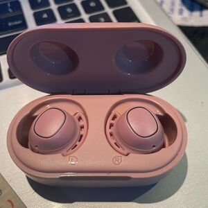 Pink wireless headphones by mpow
